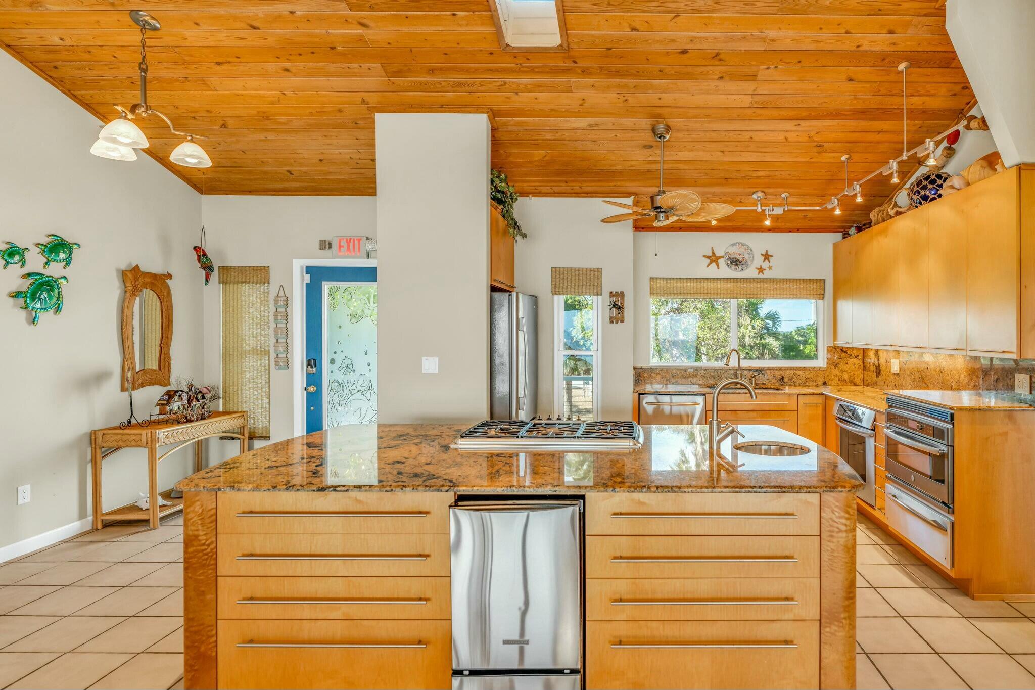 1073 Long Beach Drive Big Pine Key, FL 33043 - Photo 12 of 55 a view of a kitchen with a sink and cabinets