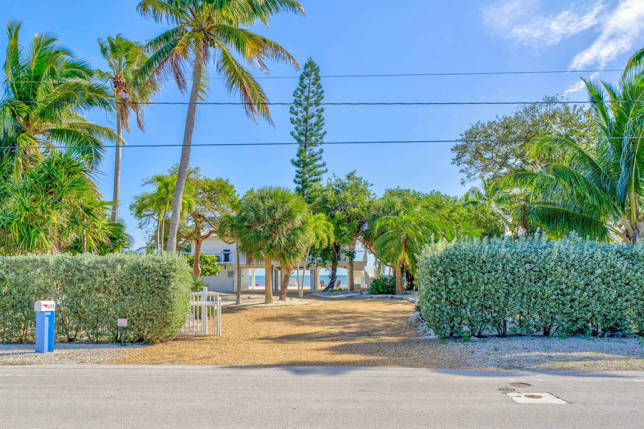 1073 Long Beach Drive Big Pine Key, FL 33043 - Photo 44 of 55 a view of street with a building in the background