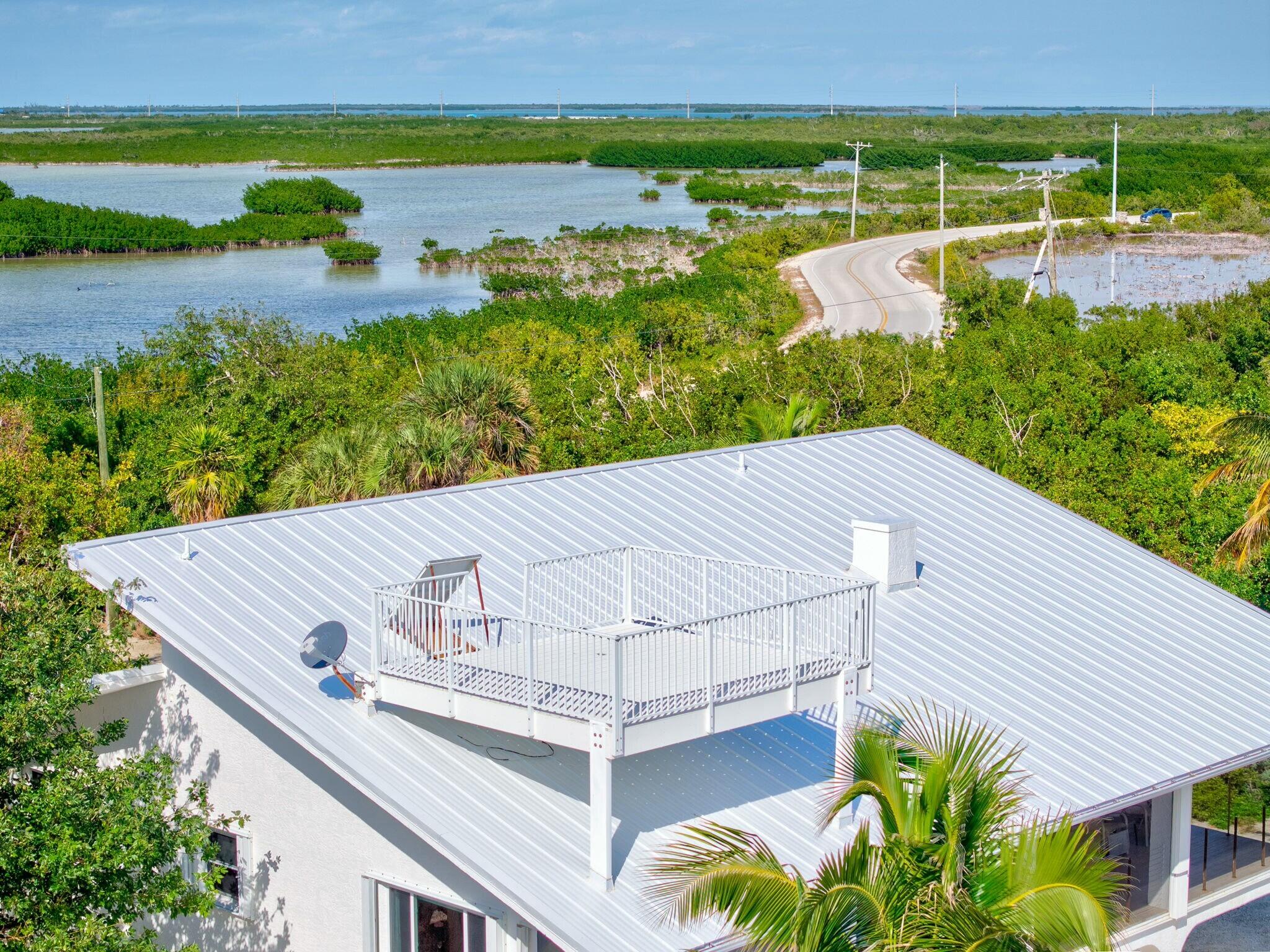 1073 Long Beach Drive Big Pine Key, FL 33043 - Photo 48 of 55 a view of a terrace with a lake view