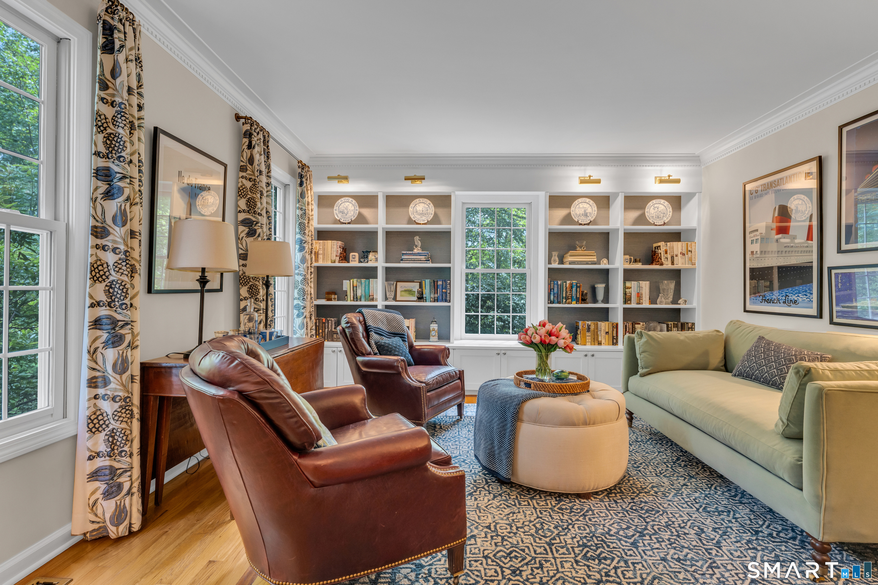 46 Laurel Cliffs Road Guilford, CT 06437 - Photo 4 of 40 The front Living Room is a serene oasis with lighted built-in book cases.