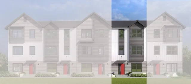 a front view of a residential apartment building with a yard