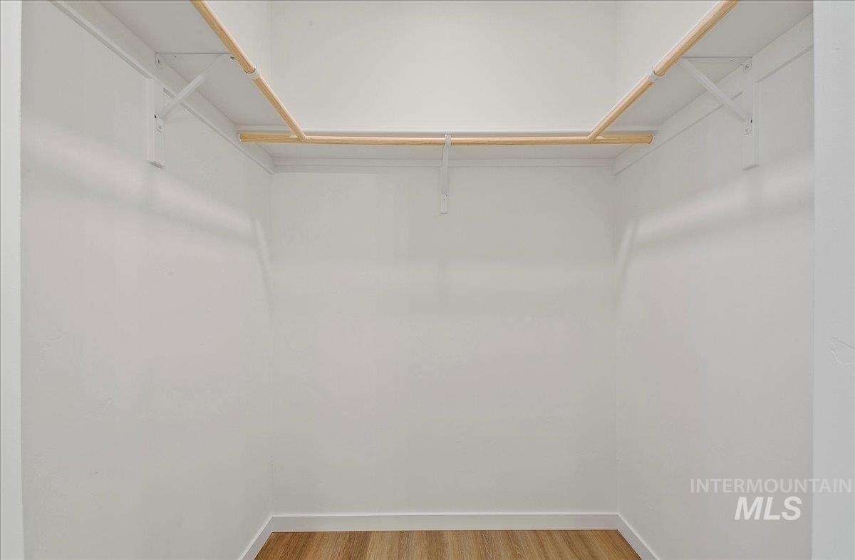 2032 South Mackinnon Lane Boise, ID 83706 - Photo 31 of 48 Walk in closet with light wood-style flooring