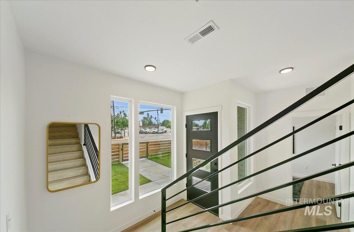 2032 South Mackinnon Lane Boise, ID 83706 - Photo 42 of 48 Doorway with stairs, wood finished floors, and recessed lighting