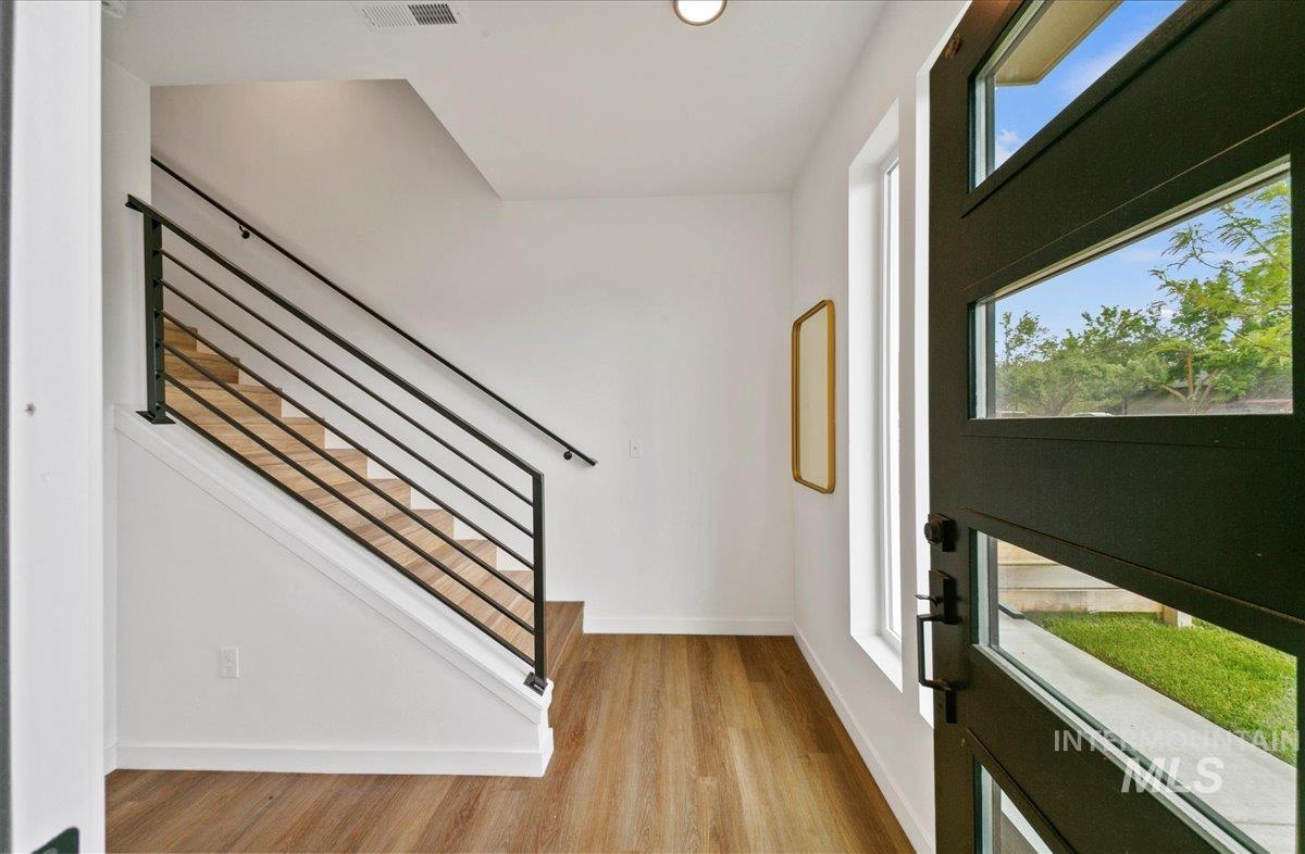 2032 South Mackinnon Lane Boise, ID 83706 - Photo 43 of 48 Entryway featuring light wood-style floors and recessed lighting