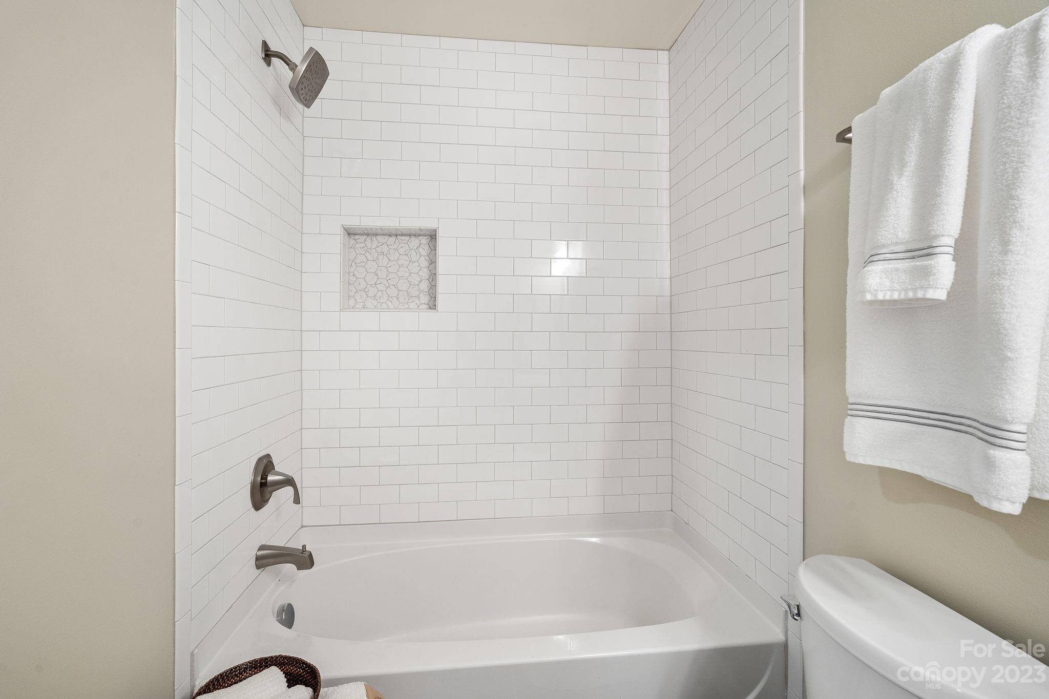 1042 Market Street Fort Mill, SC 29708 - Photo 19 of 34 a bathroom with a bathtub