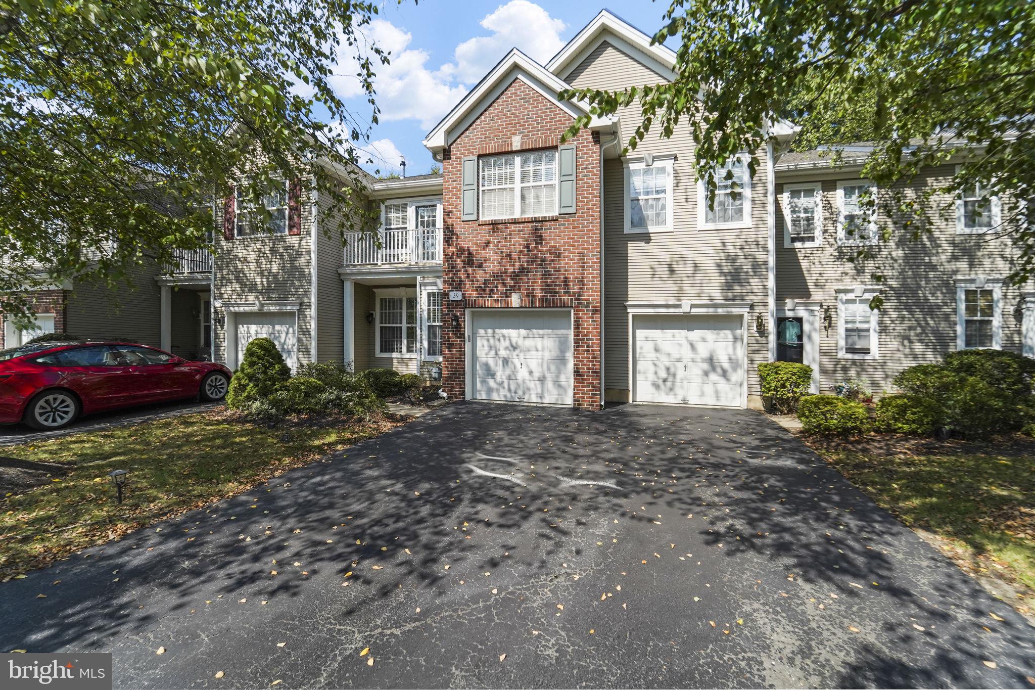 39 Normandy Drive Princeton Junction, NJ 08550 - Photo 2 of 2 a view of a house with a yard