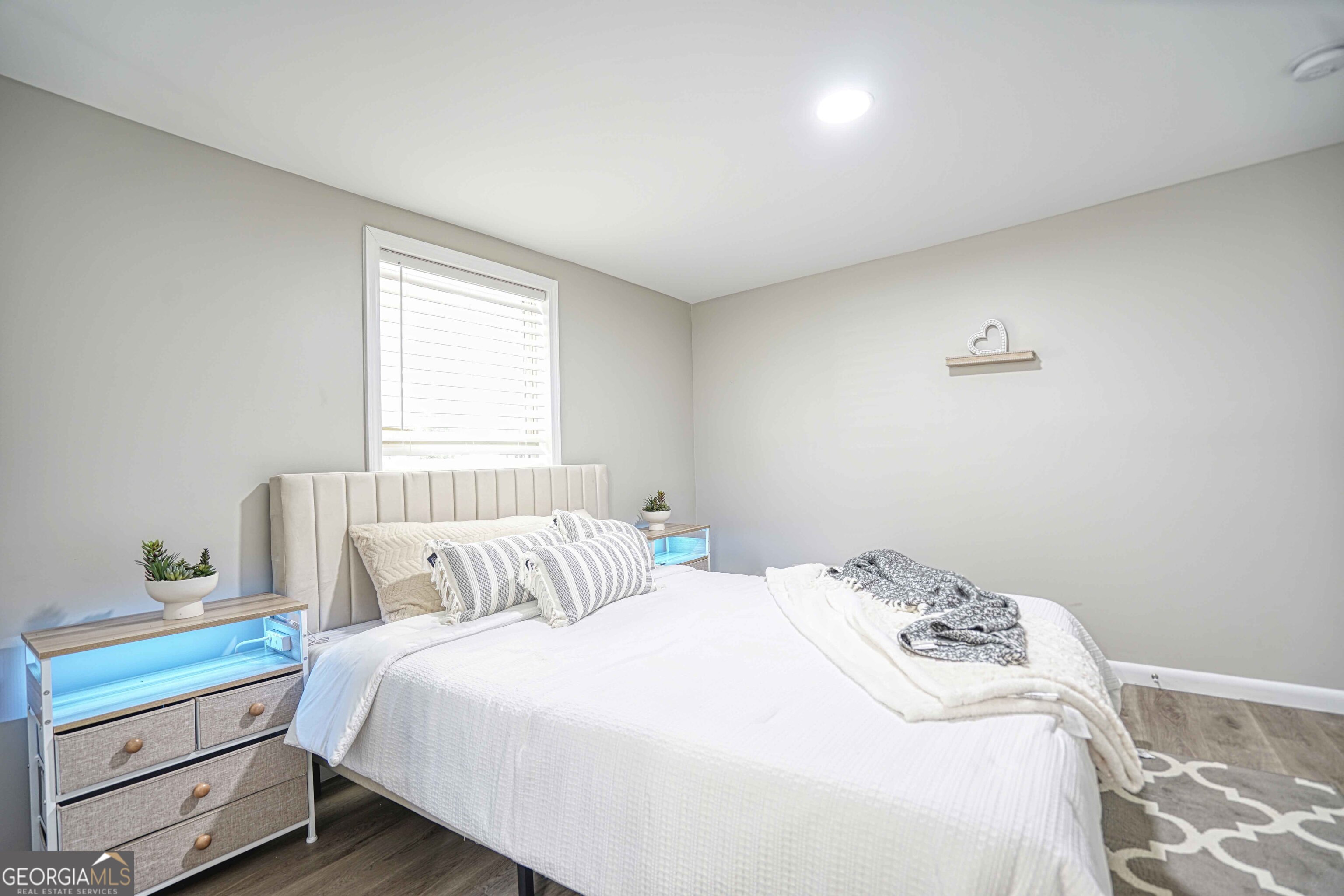 1827 Dunlap Avenue East Point, GA 30344 - Photo 15 of 32 a bedroom with a bed and a window