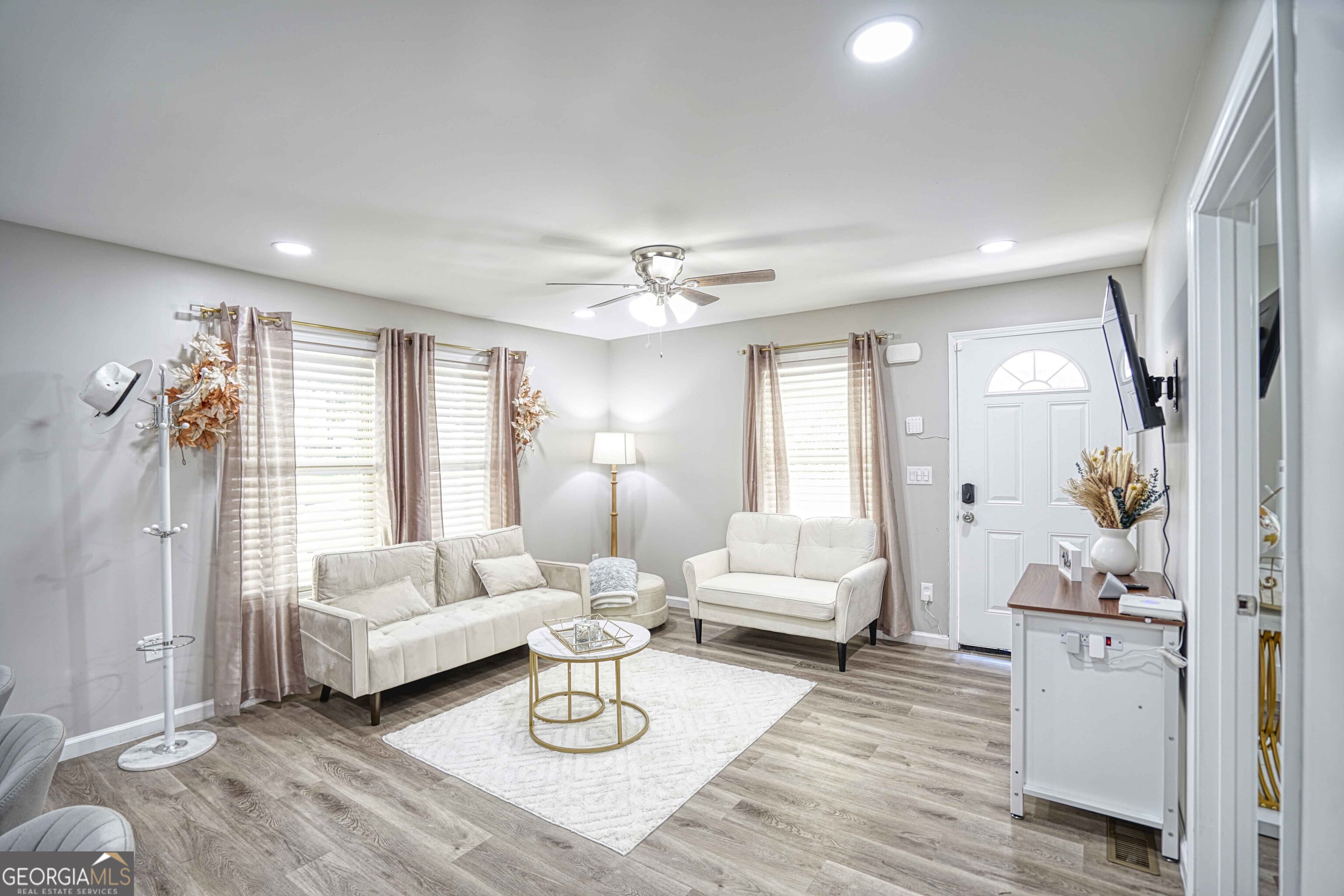 1827 Dunlap Avenue East Point, GA 30344 - Photo 2 of 32 a living room with furniture and wooden floor