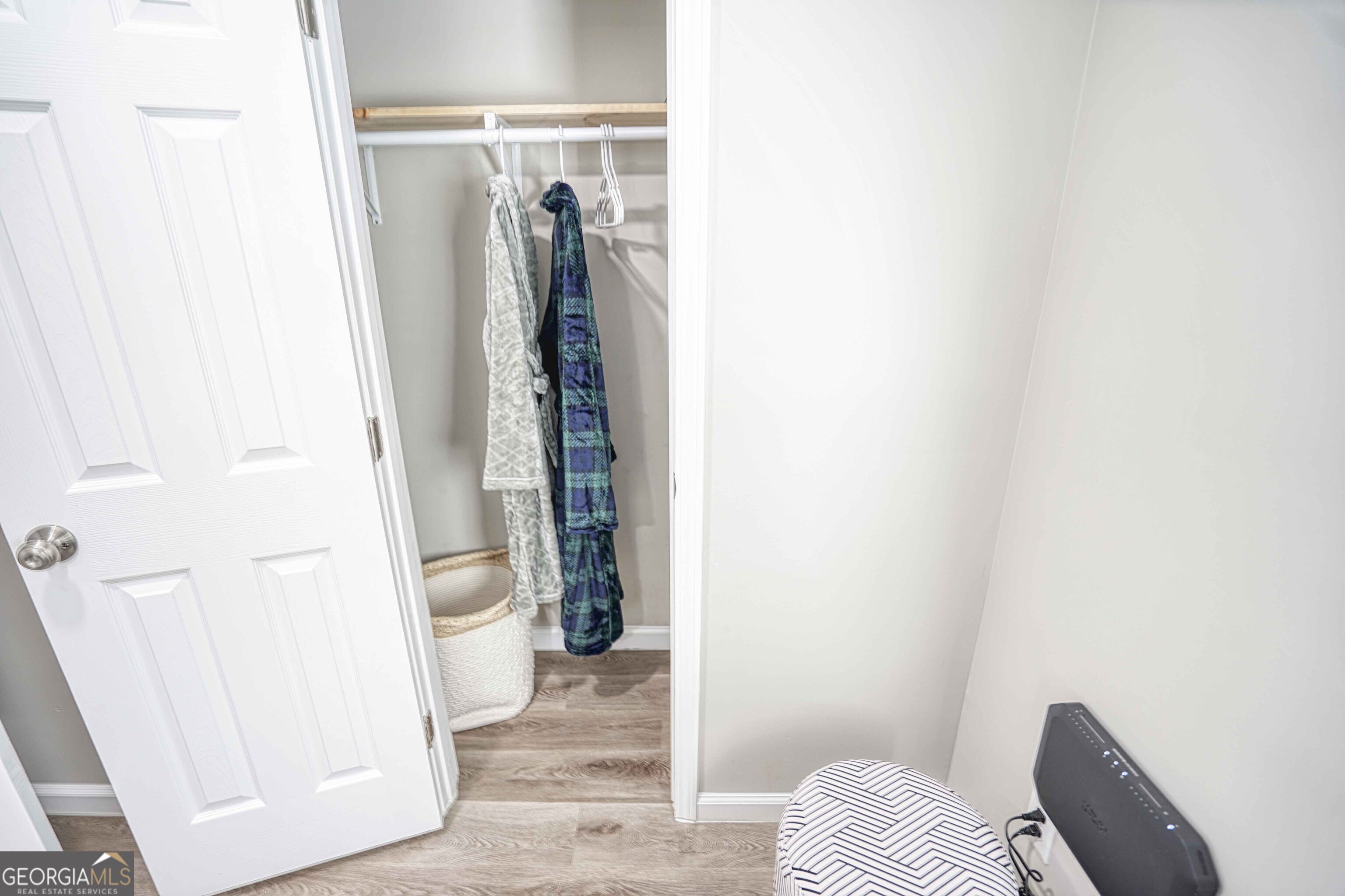 1827 Dunlap Avenue East Point, GA 30344 - Photo 25 of 32 a view of walk in closet with clothes and shoes
