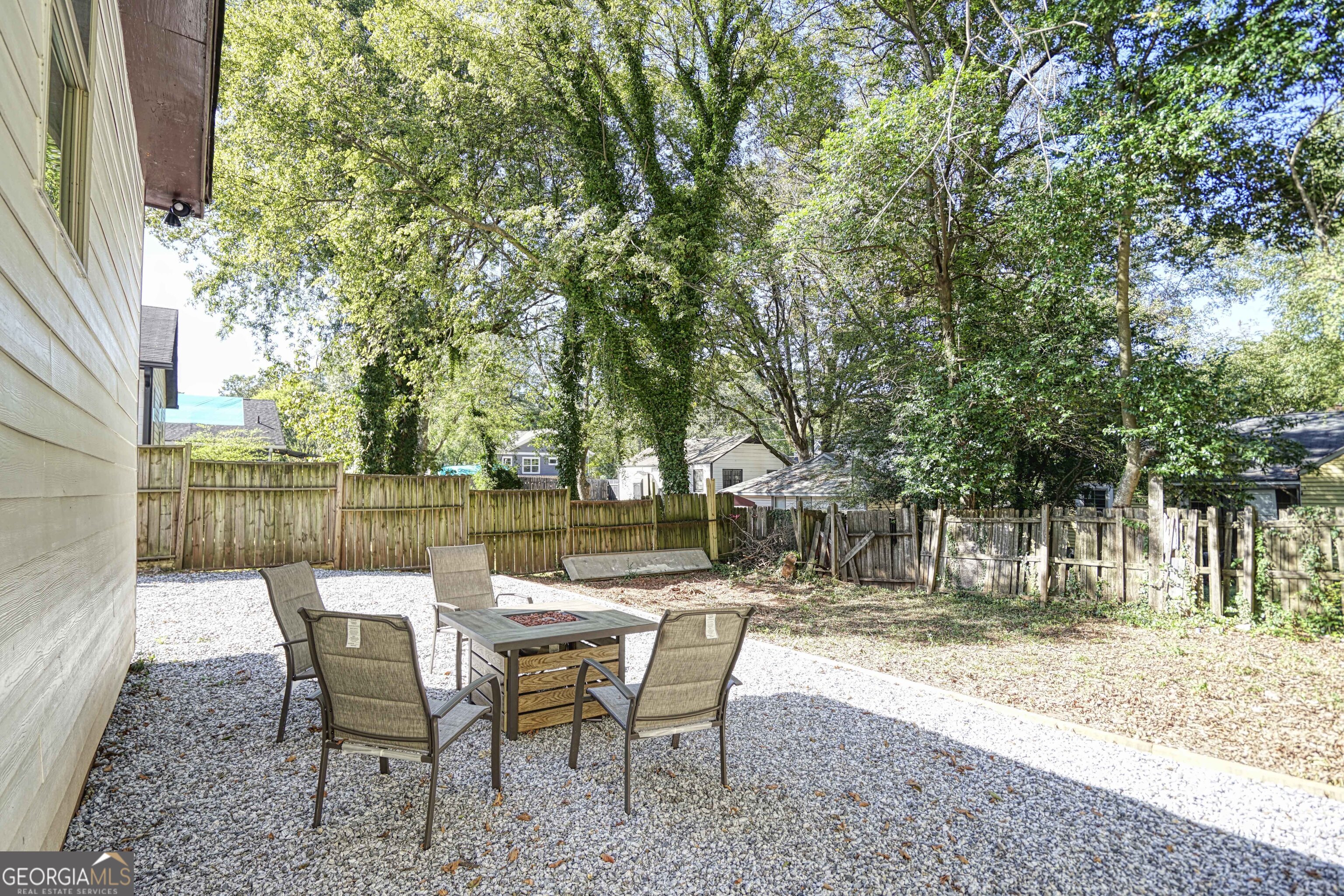 1827 Dunlap Avenue East Point, GA 30344 - Photo 29 of 32 a view of a patio with a table and chairs