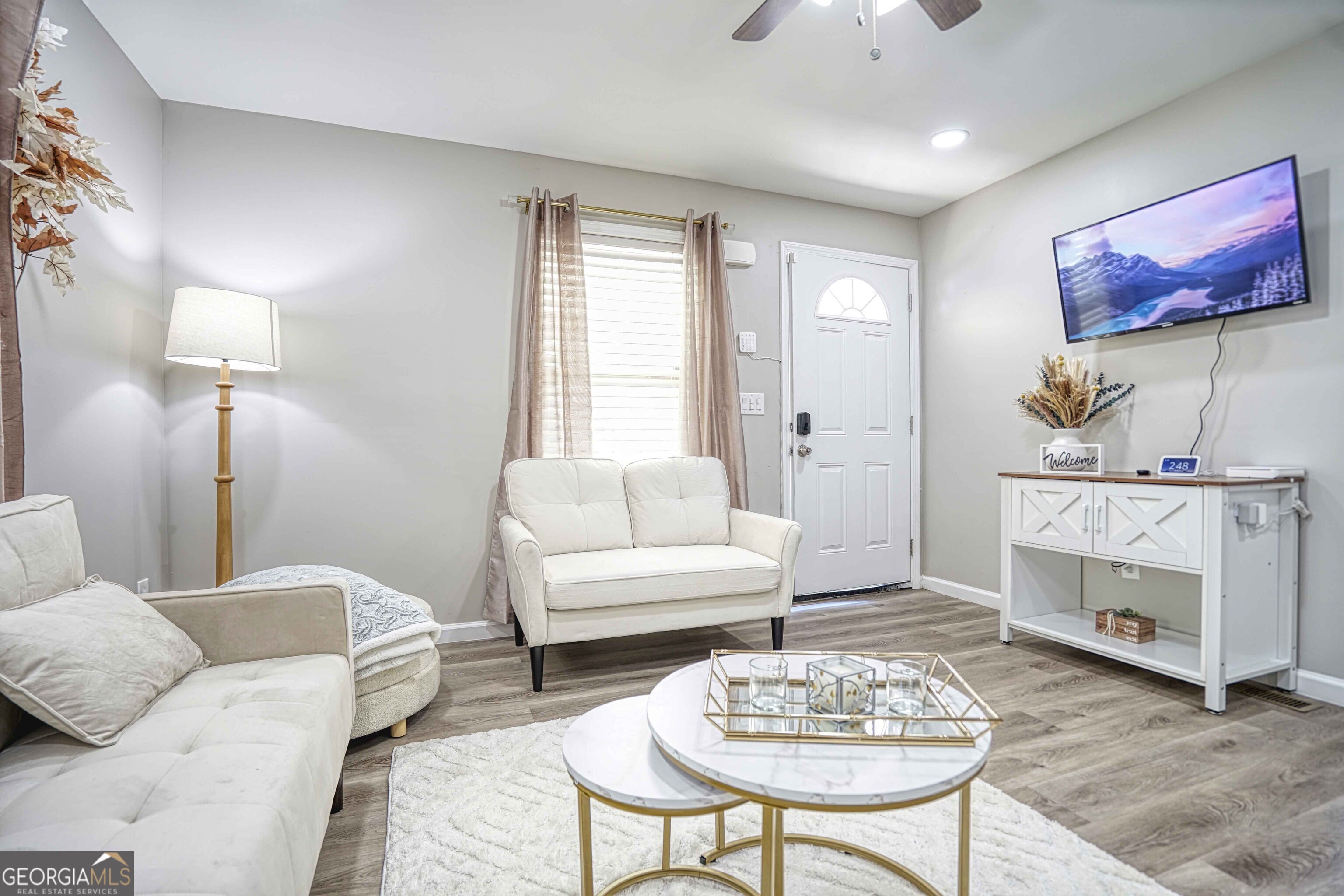 1827 Dunlap Avenue East Point, GA 30344 - Photo 3 of 32 a living room with furniture and a fireplace