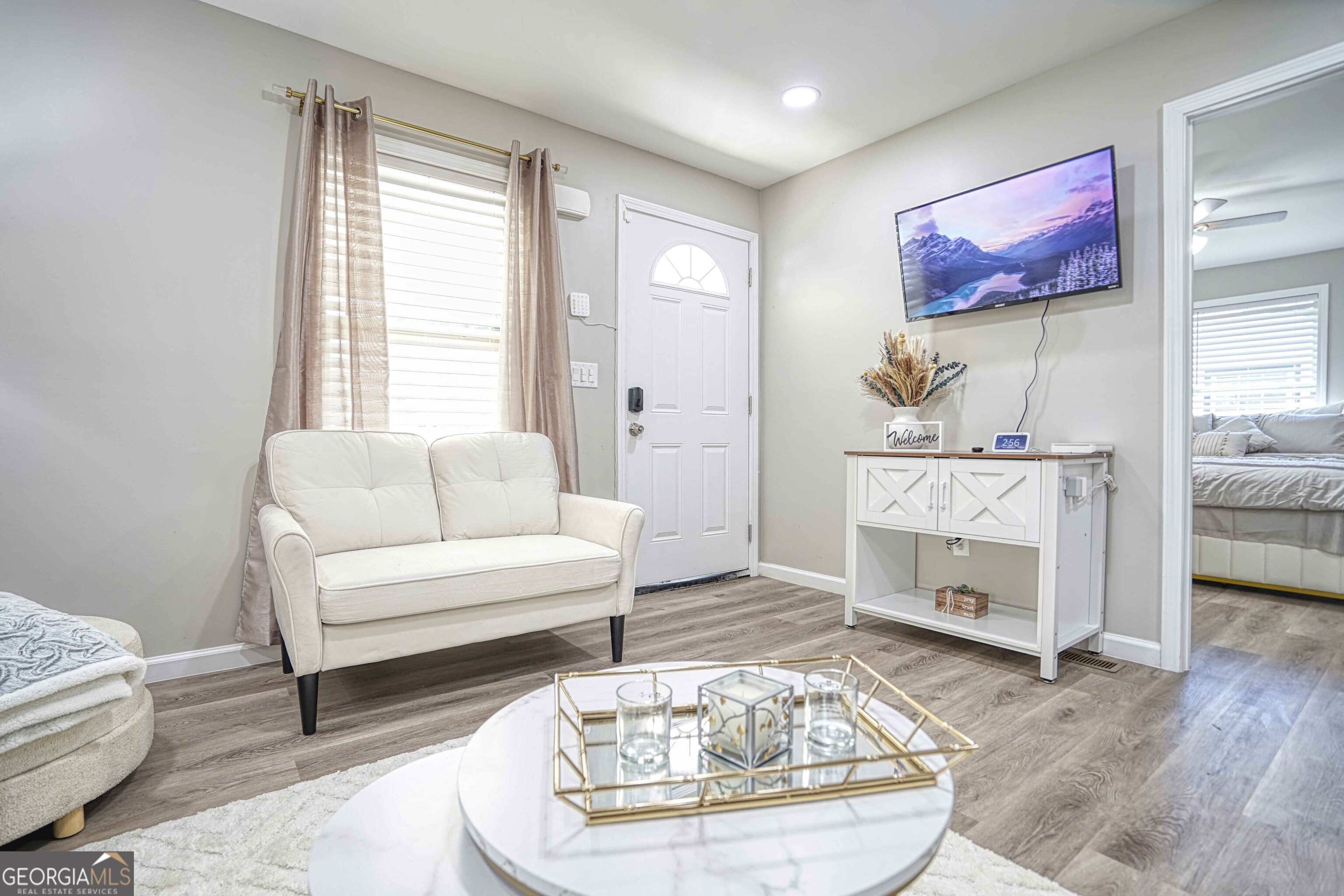 1827 Dunlap Avenue East Point, GA 30344 - Photo 4 of 32 a living room with furniture and a fireplace