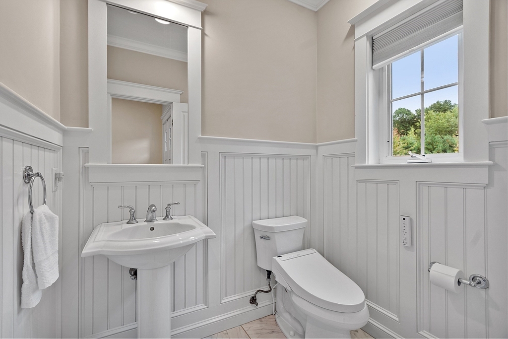 42 Fox Run Road Bolton, MA 01740 - Photo 13 of 42 a bathroom with a toilet sink and mirror