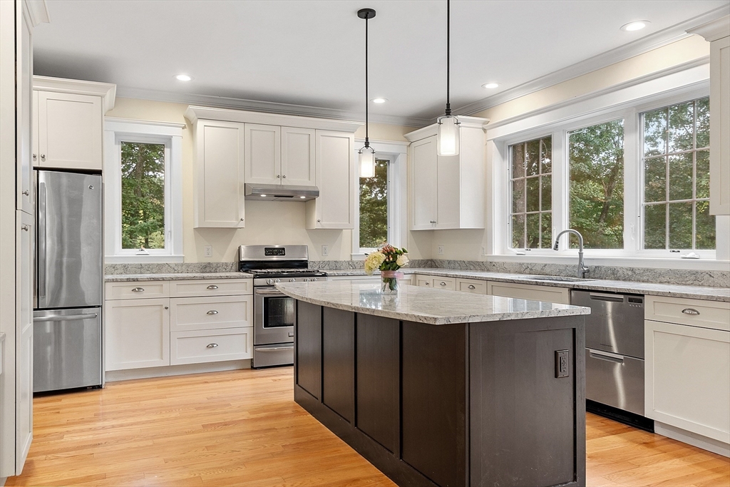 42 Fox Run Road Bolton, MA 01740 - Photo 3 of 42 a kitchen with a sink stove and refrigerator