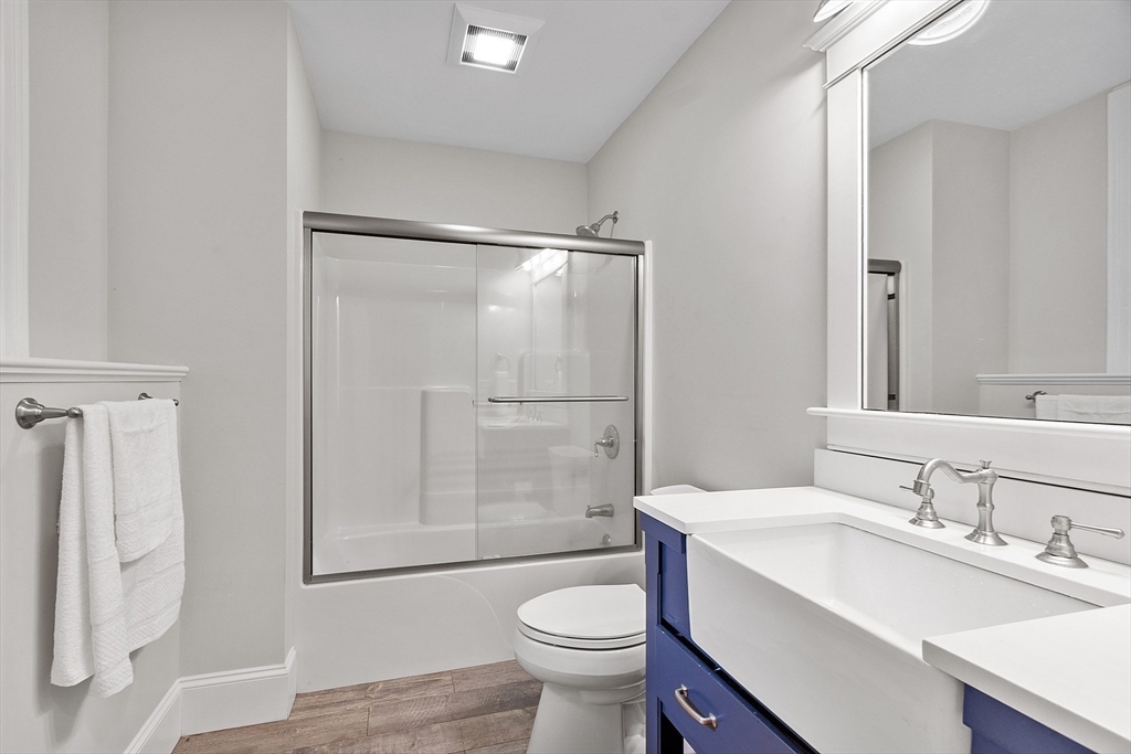 42 Fox Run Road Bolton, MA 01740 - Photo 33 of 42 a bathroom with a sink a toilet and shower