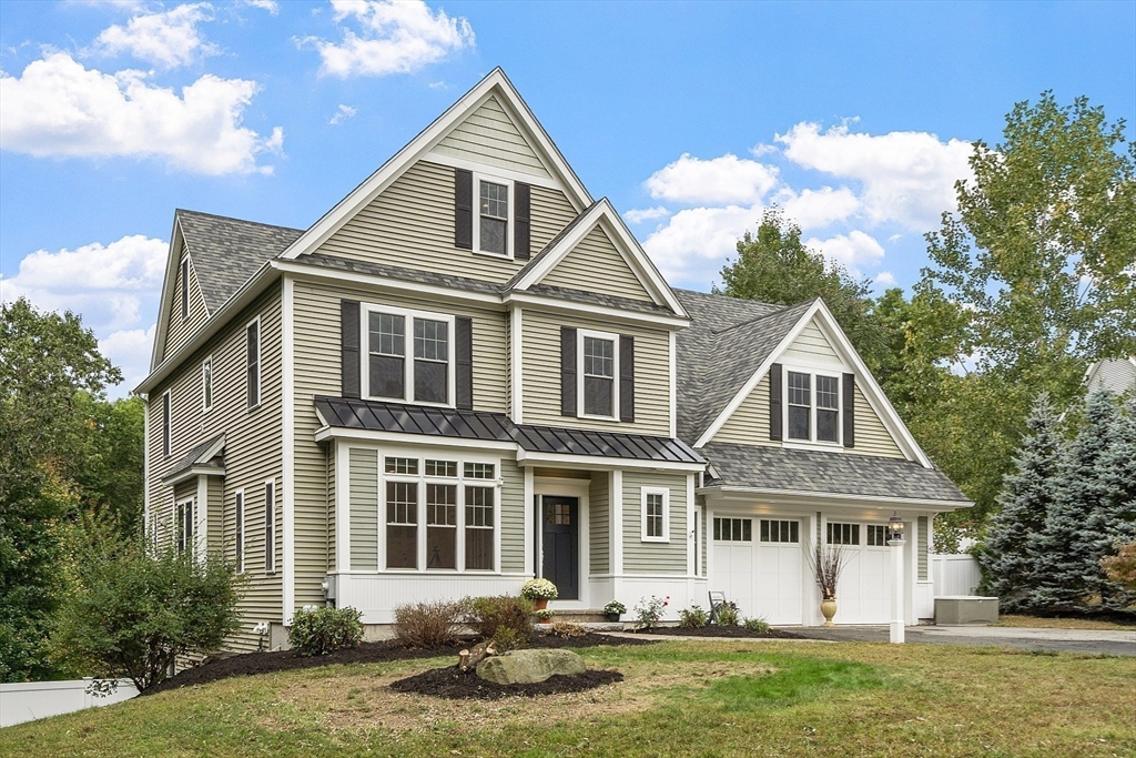 42 Fox Run Road Bolton, MA 01740 - Photo 36 of 42 a front view of a house with a yard