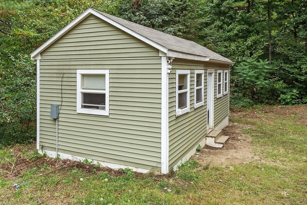 42 Fox Run Road Bolton, MA 01740 - Photo 38 of 42 a view of a house with a yard