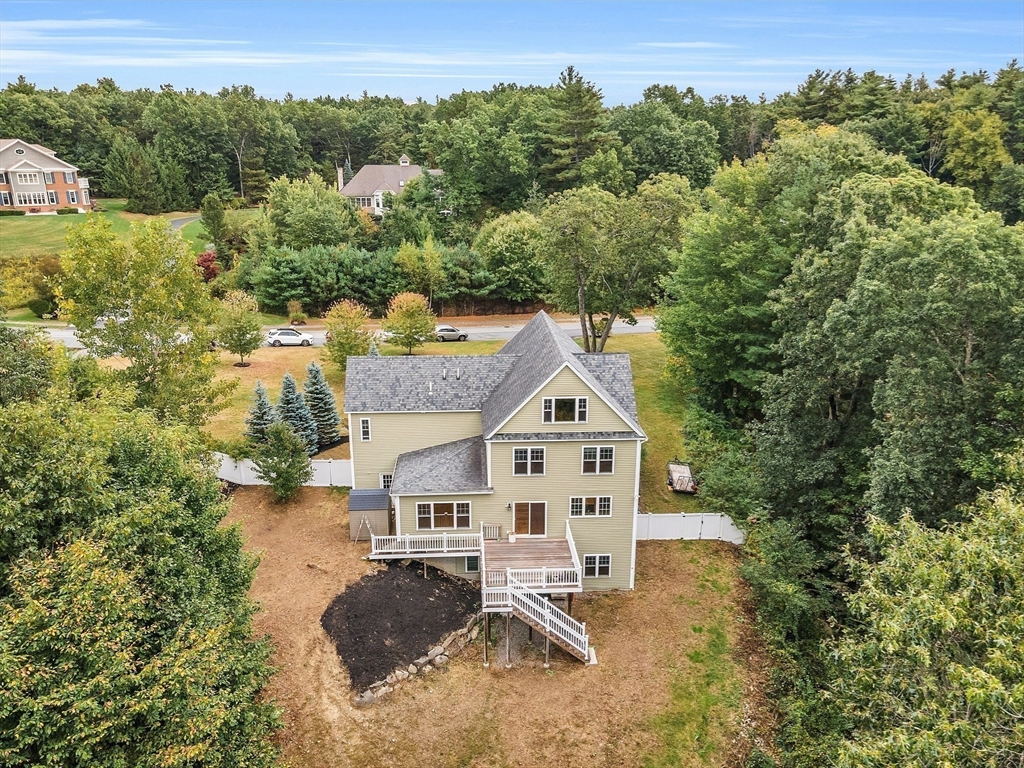 42 Fox Run Road Bolton, MA 01740 - Photo 40 of 42 an aerial view of a house with a yard