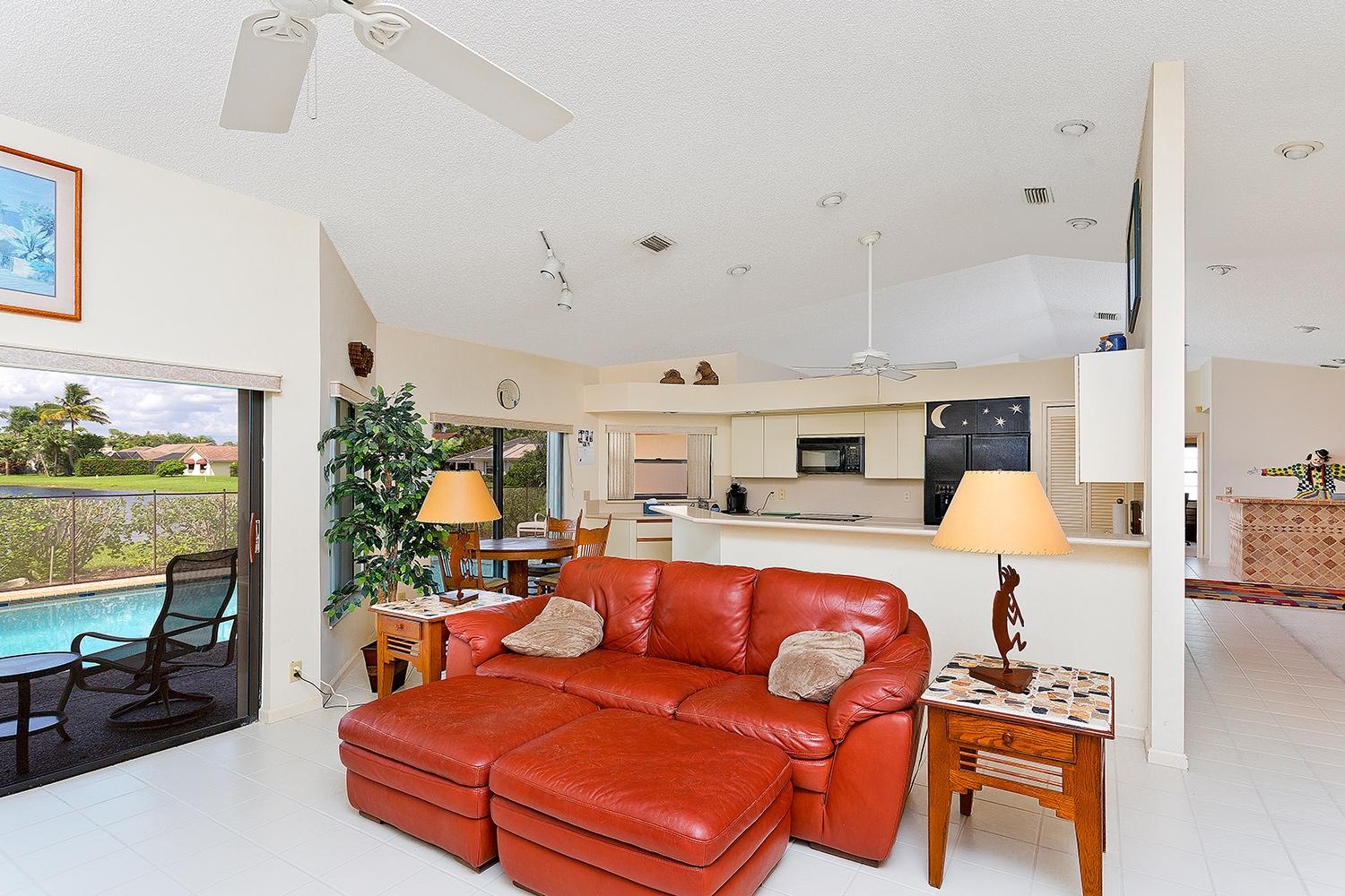 22337 Boyaca Avenue Boca Raton, FL 33433 - Photo 20 of 30 Family room to kitchen