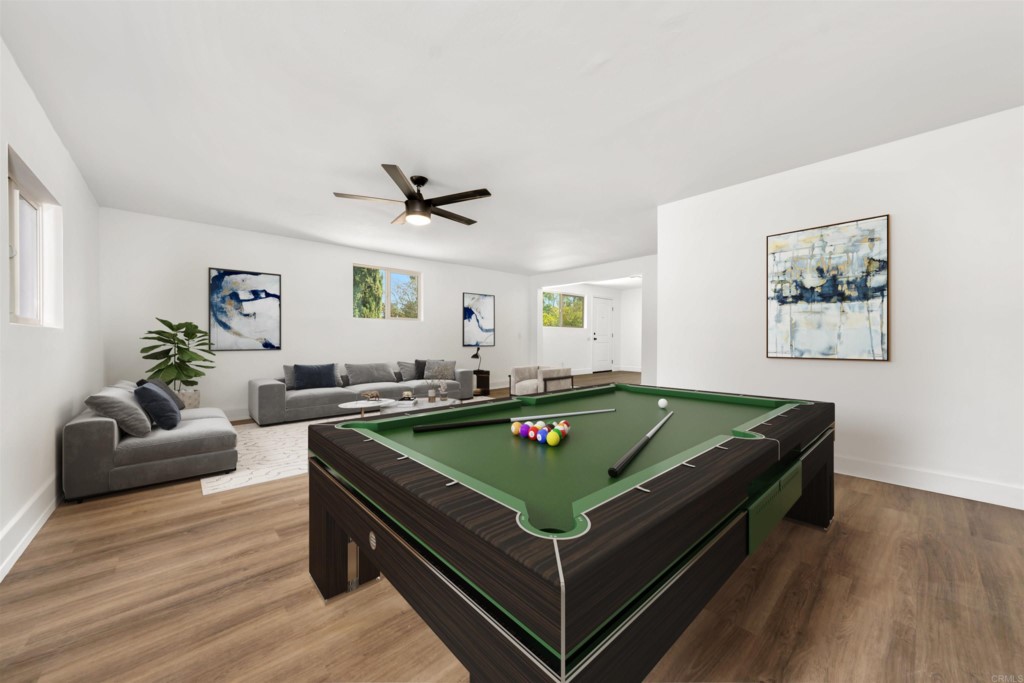 1740 Wind River Road El Cajon, CA 92019 - Photo 12 of 35 a living room with furniture pool table and a window