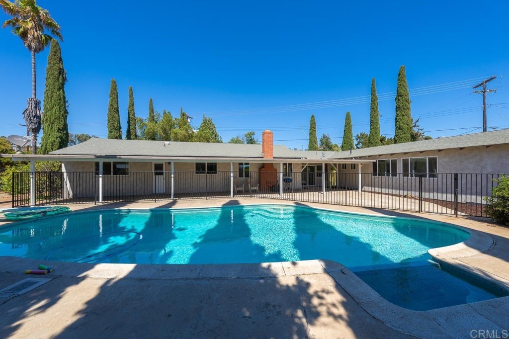 1740 Wind River Road El Cajon, CA 92019 - Photo 2 of 35 a view of a house with swimming pool