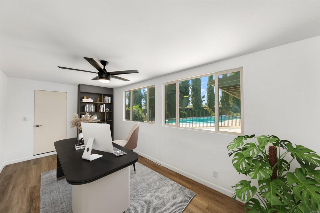 1740 Wind River Road El Cajon, CA 92019 - Photo 21 of 35 a living room with furniture and a potted plant