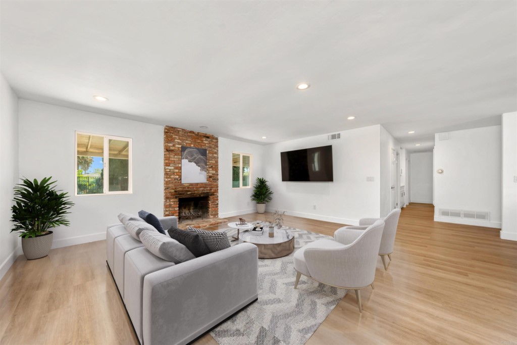 1740 Wind River Road El Cajon, CA 92019 - Photo 3 of 35 a living room with furniture and a flat screen tv