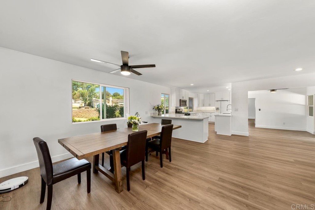 1740 Wind River Road El Cajon, CA 92019 - Photo 10 of 35 a view of a dining room with furniture and wooden floor