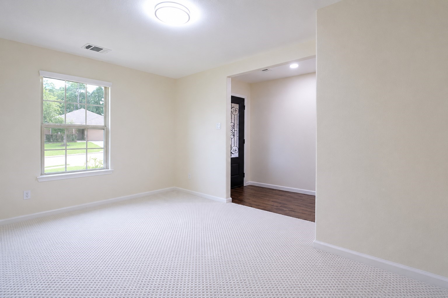 5612 Rainflower Terrace Lane Spring, TX 77389 - Photo 6 of 50 an empty room with windows and closet