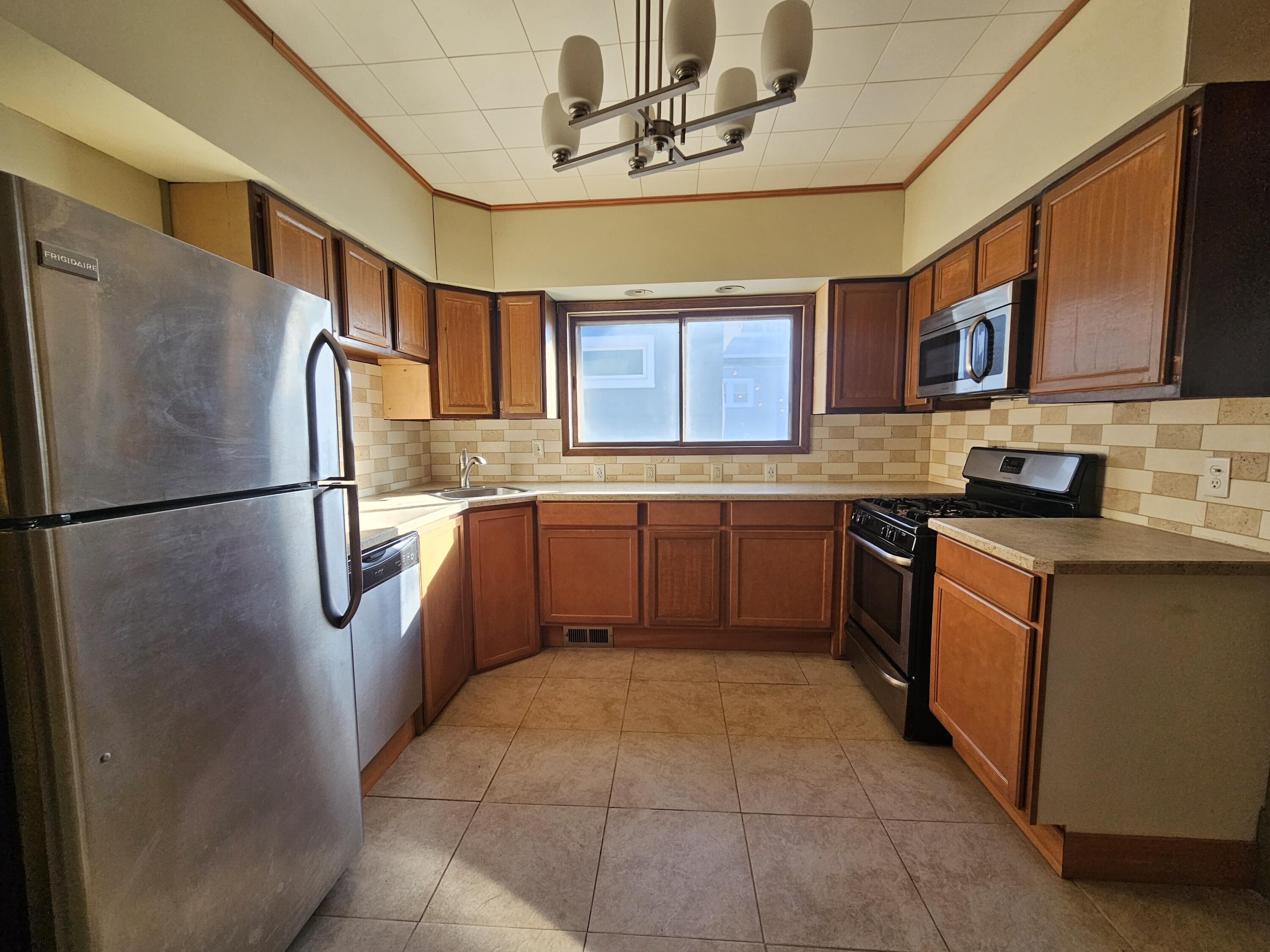 1835 North 55th Street Milwaukee, WI 53208 - Photo 7 of 23 Lower Kitchen