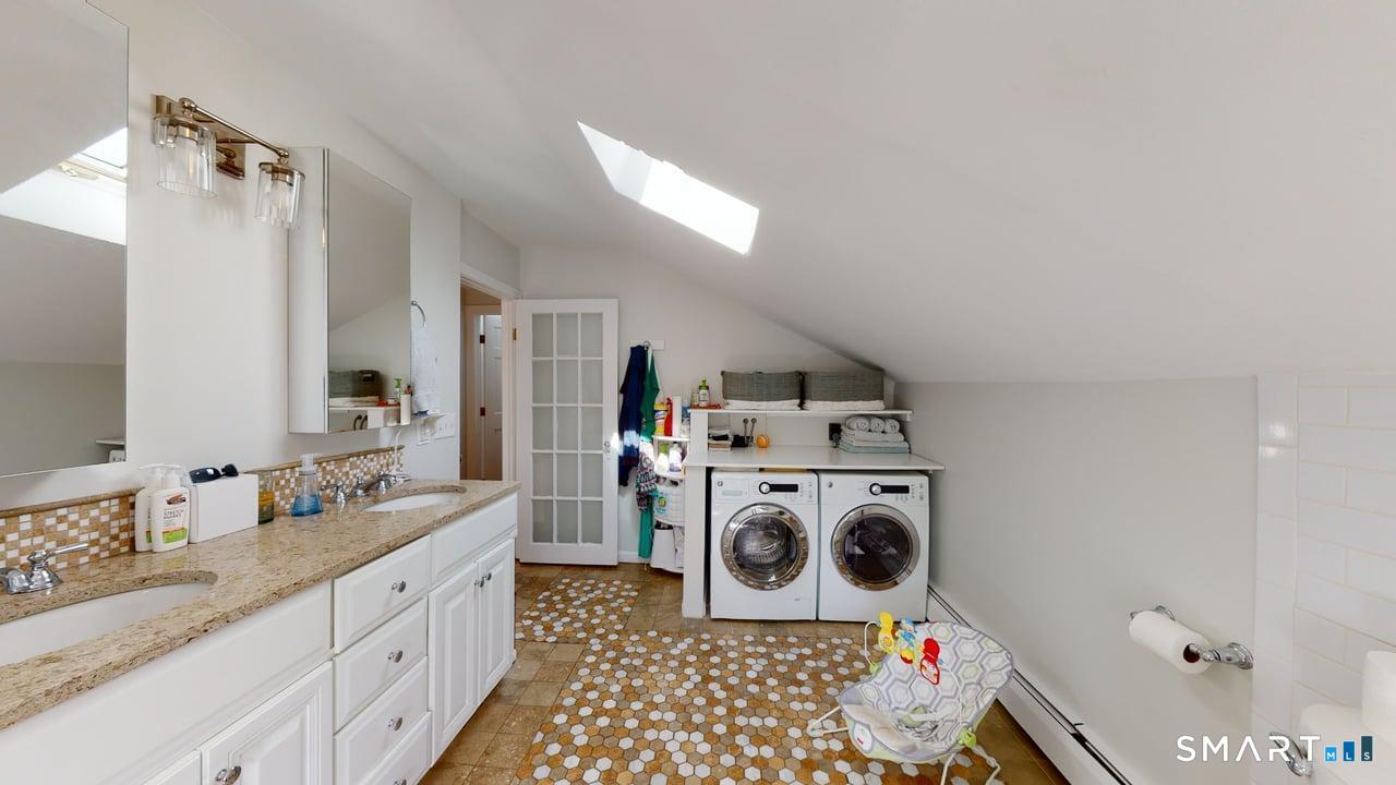 6 Eld Street New Haven, CT 06511 - Photo 2 of 43 a utility room with sink dryer and washer