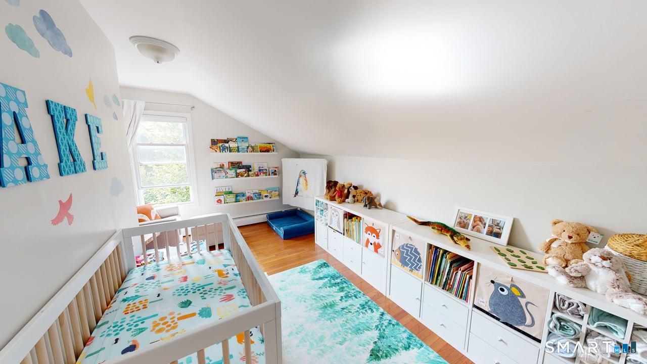 6 Eld Street New Haven, CT 06511 - Photo 23 of 43 a children room with toys and a book shelf