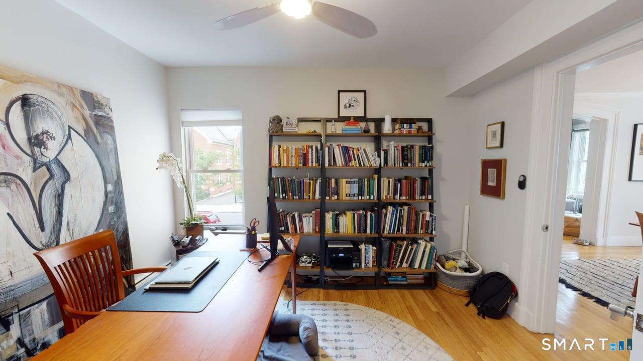 6 Eld Street New Haven, CT 06511 - Photo 28 of 43 a view of a livingroom with furniture bookshelf and a window