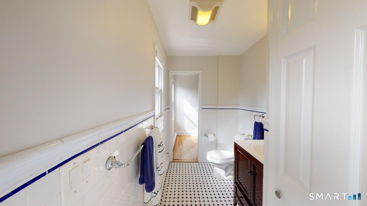 6 Eld Street New Haven, CT 06511 - Photo 29 of 43 a bathroom with a sink a toilet and shower