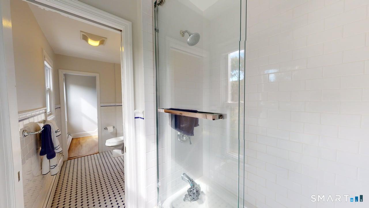 6 Eld Street New Haven, CT 06511 - Photo 38 of 43 a bathroom with a shower and a mirror