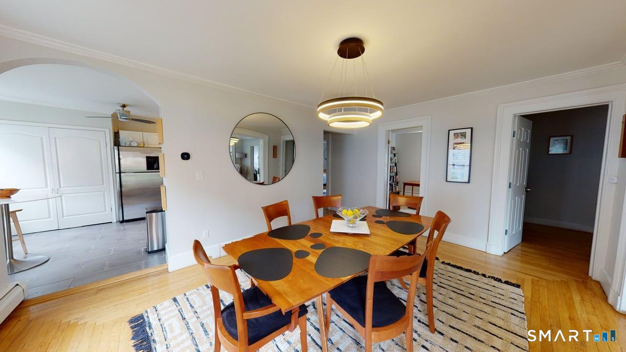 6 Eld Street New Haven, CT 06511 - Photo 41 of 43 a dining room with a table and chairs