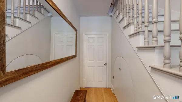 a view of entryway with a front door