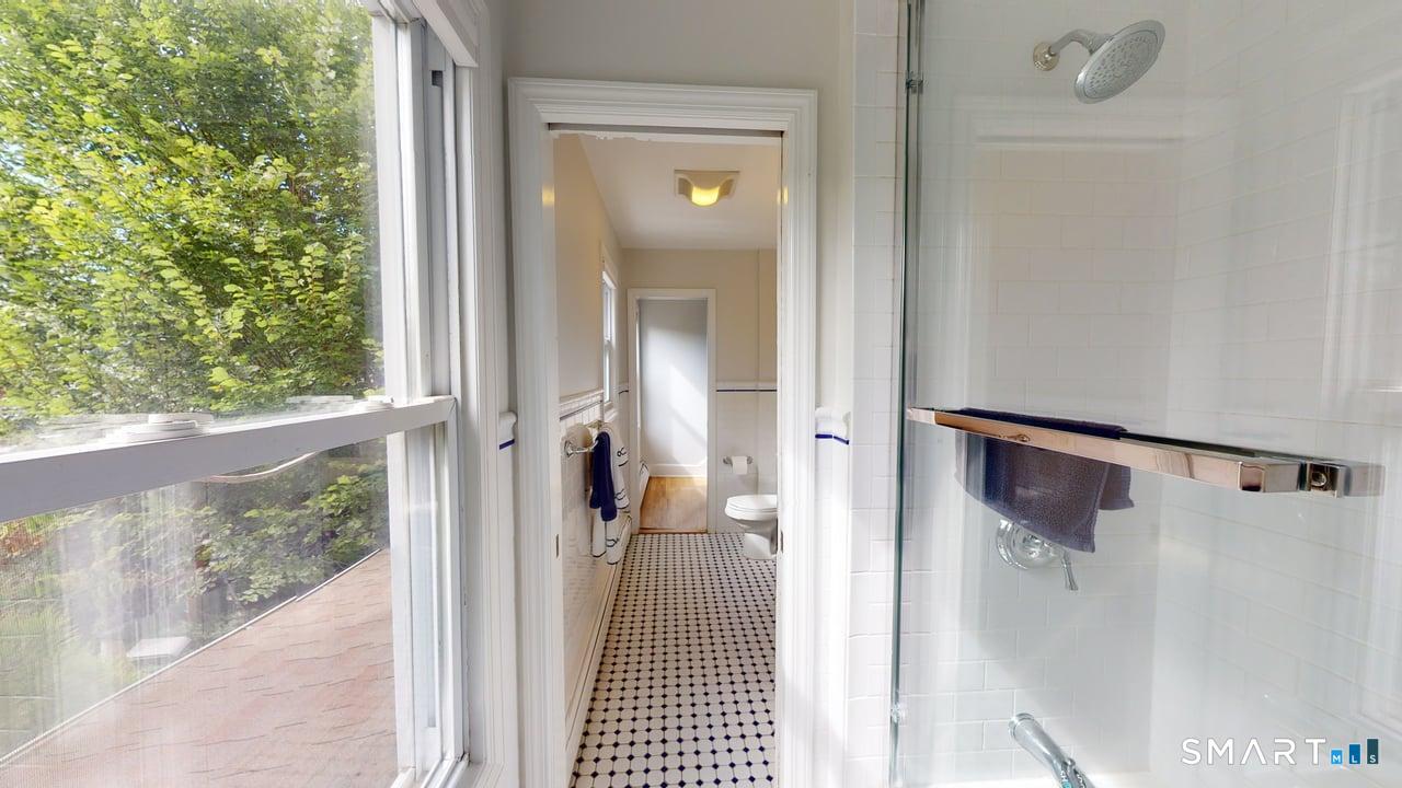 6 Eld Street New Haven, CT 06511 - Photo 9 of 43 a view of a bathroom from a hallway