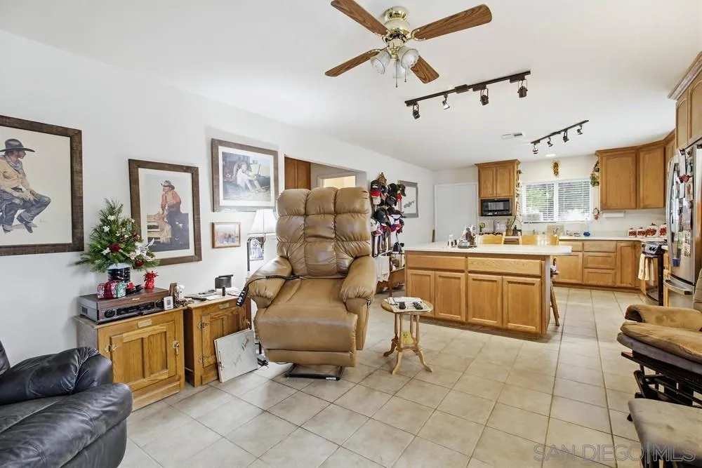 1478 Peutz Valley Road Alpine, CA 91901 - Photo 15 of 63 a living room with furniture and kitchen view