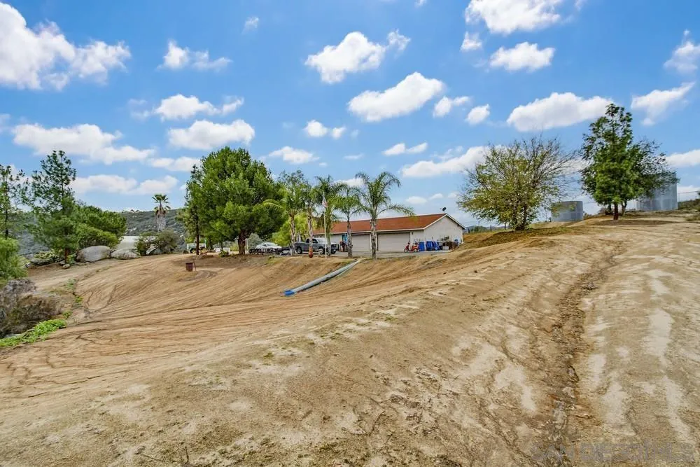 1478 Peutz Valley Road Alpine, CA 91901 - Photo 27 of 63 a view of a road with a yard