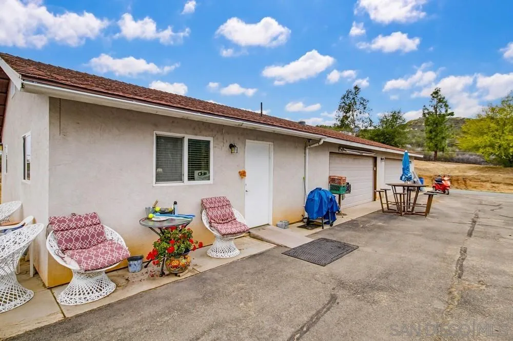 1478 Peutz Valley Road Alpine, CA 91901 - Photo 4 of 63 a view of a two chair in the patio