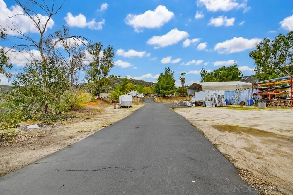 1478 Peutz Valley Road Alpine, CA 91901 - Photo 42 of 63 a view of house with outdoor space and sitting area