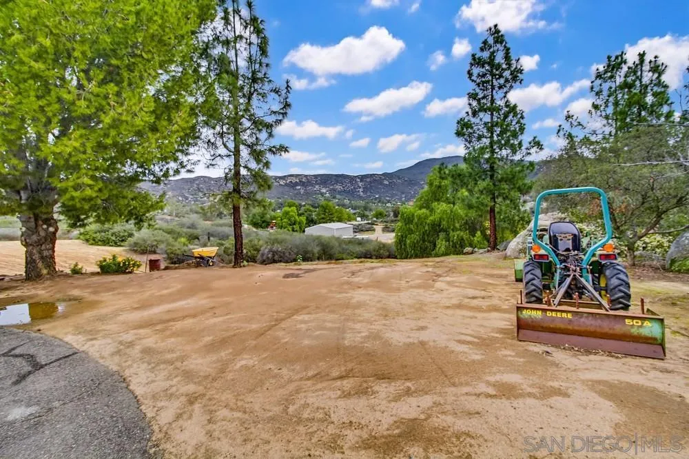 1478 Peutz Valley Road Alpine, CA 91901 - Photo 57 of 63 a view of a park with swings and slides