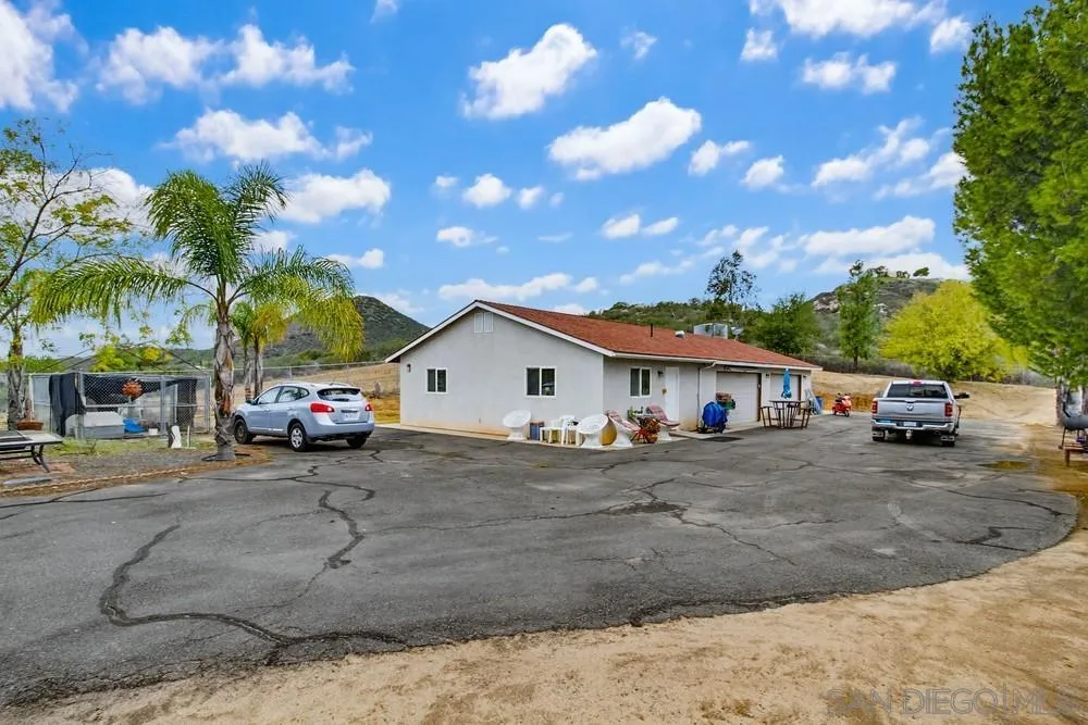 1478 Peutz Valley Road Alpine, CA 91901 - Photo 6 of 63 a view of a house with a patio