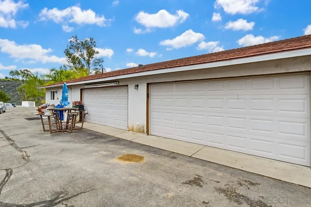 1478 Peutz Valley Road Alpine, CA 91901 - Photo 7 of 63 a view of backyard with wheel chair and potted plants
