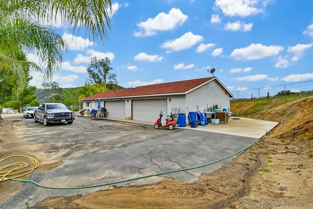 1478 Peutz Valley Road Alpine, CA 91901 - Photo 8 of 63 a view of a car park in front of house