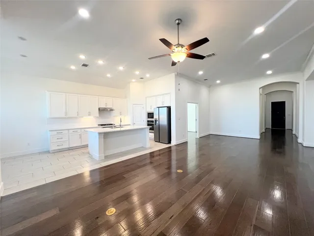 a kitchen with a sink and an oven