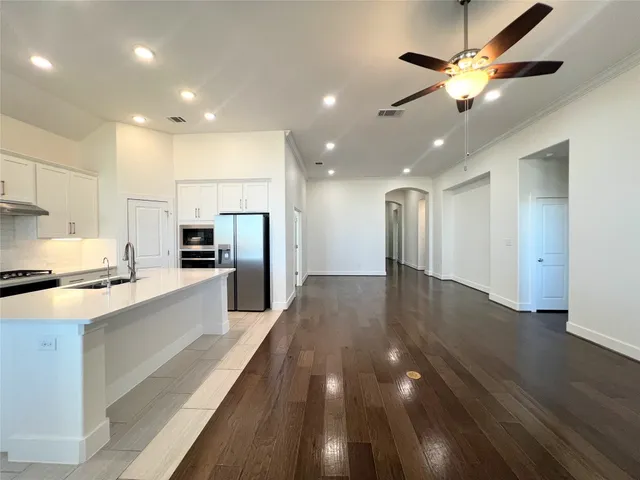 a bathroom with a bathtub and a sink