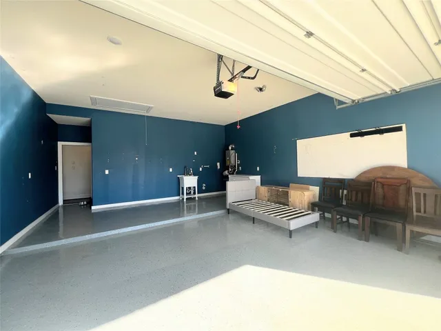 a kitchen with a stove and a refrigerator