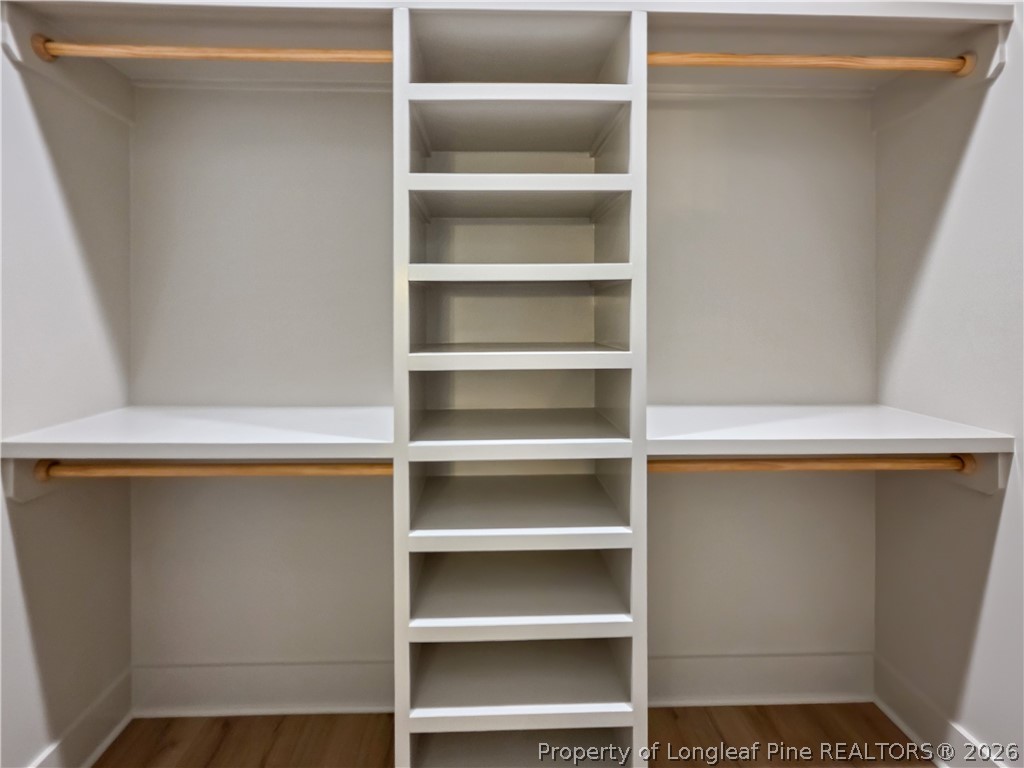 900 Niagara Carthage Road Carthage, NC 28327 - Photo 13 of 38 a view of walk in closet with empty racks